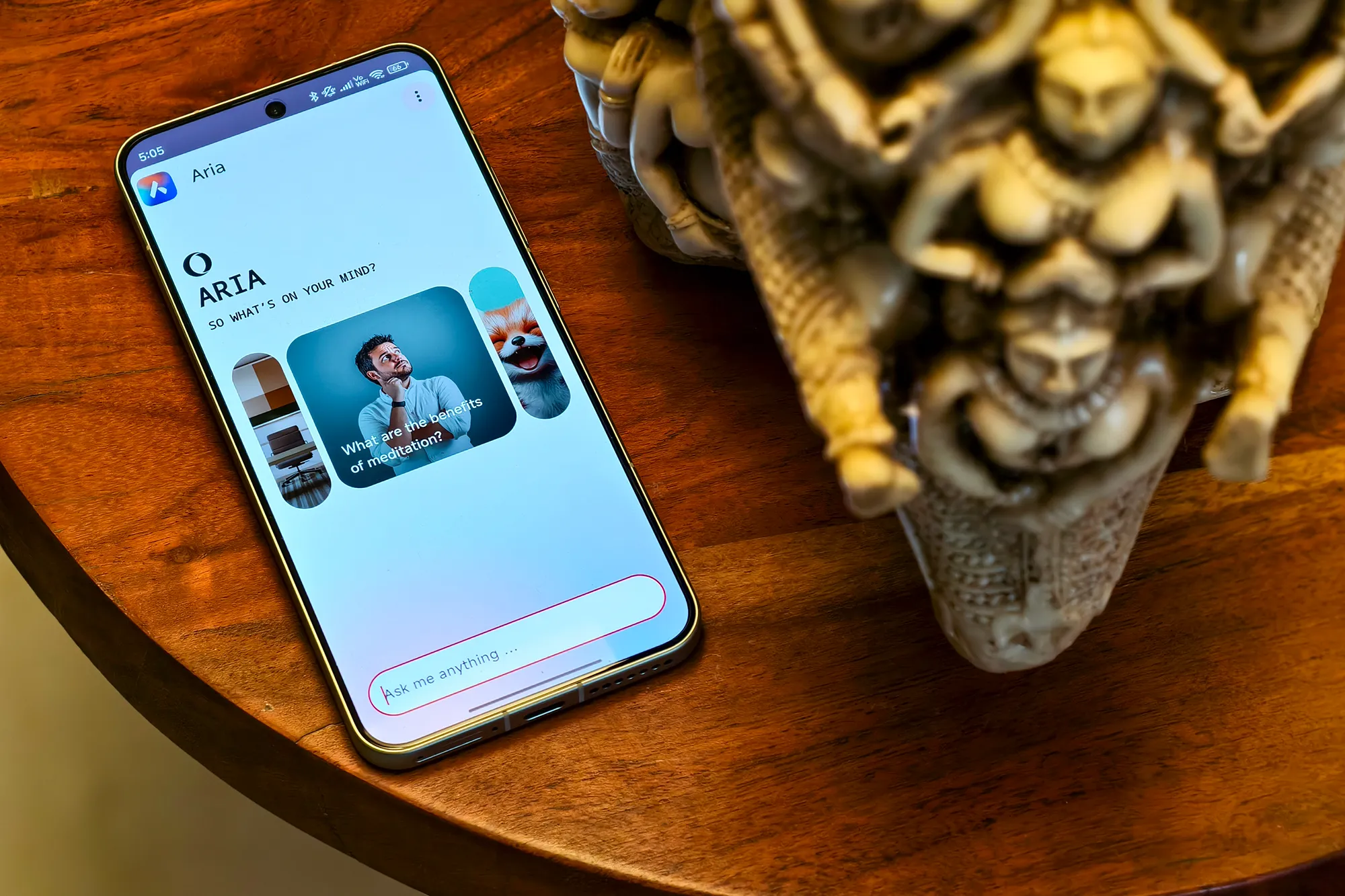 Opera Mini AI chatbot running on a phone kept on a round table.