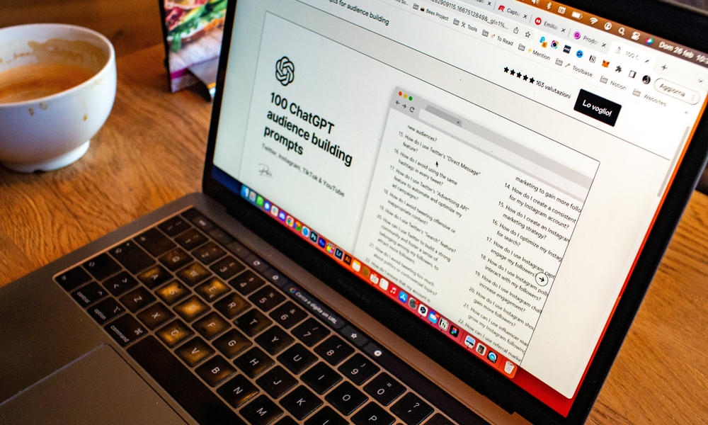 MacBook Pro showing ChatGPT prompts