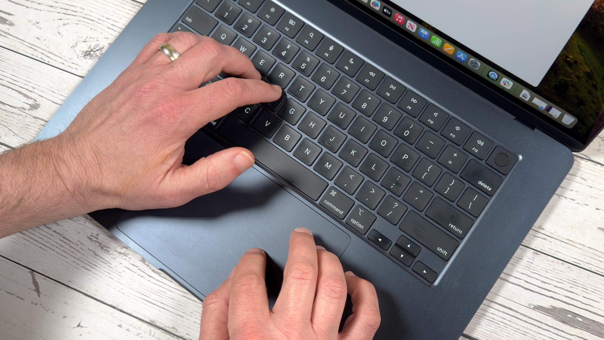 Person typing on the MacBook Air 15-inch M3