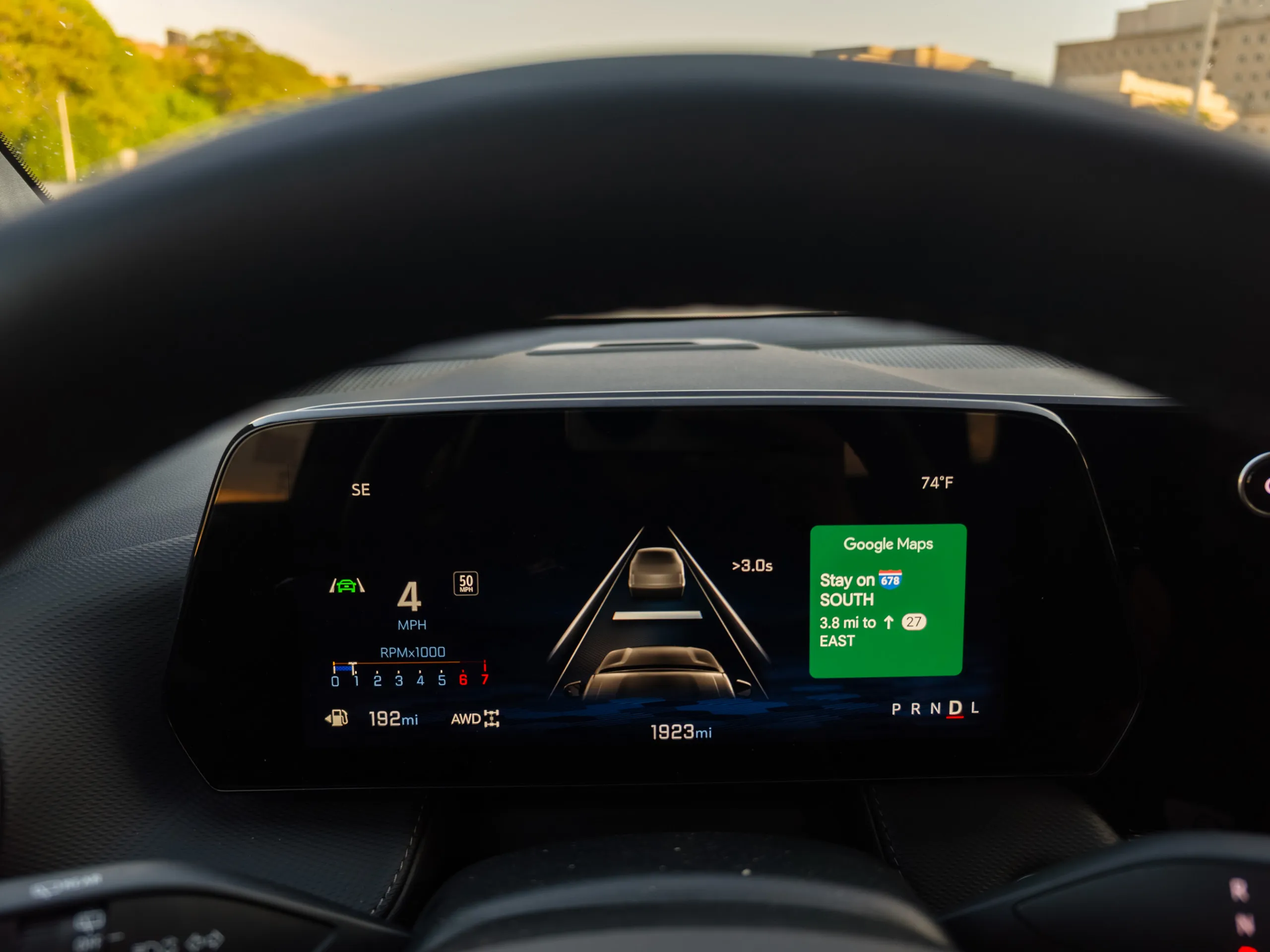 Driver's digital display showing Google Maps navigation alongside distance to car and trip information on the Chevy Equinox 2025 SUV