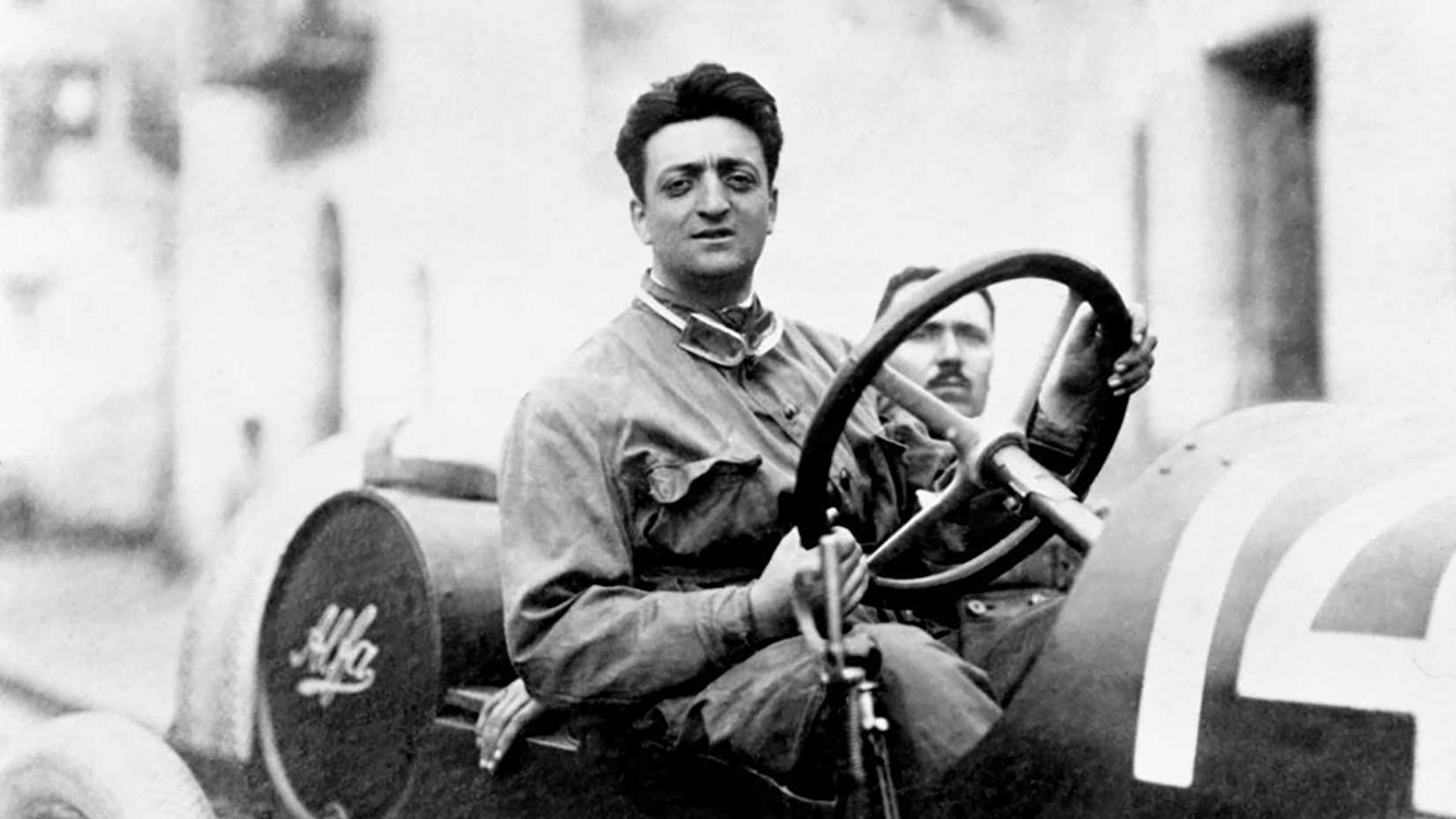 Young Enzo Ferrari in racing car