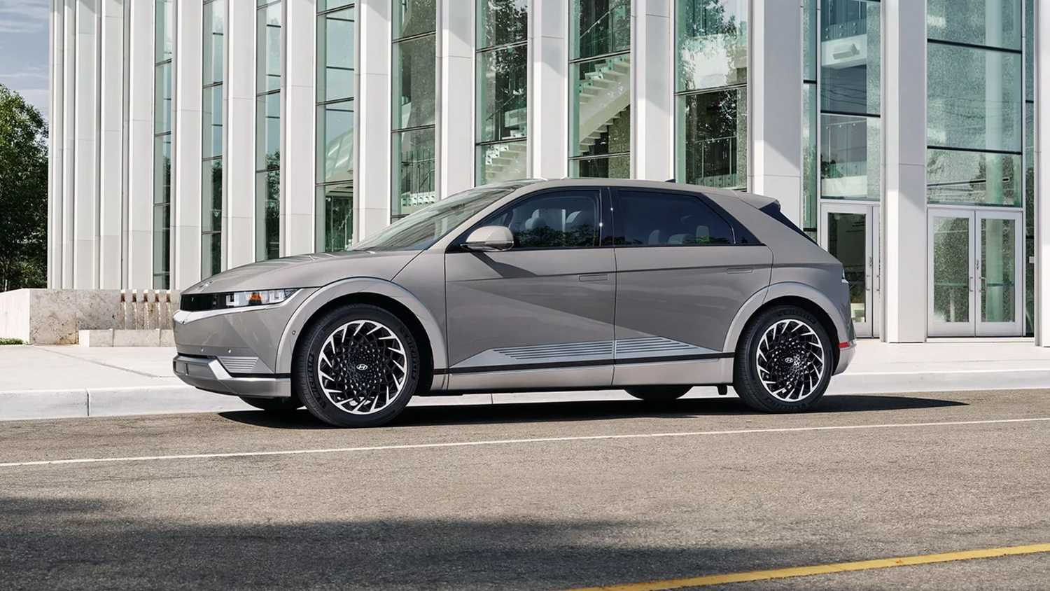 Hyundai Ioniq 5 EV SUV in front of a building.