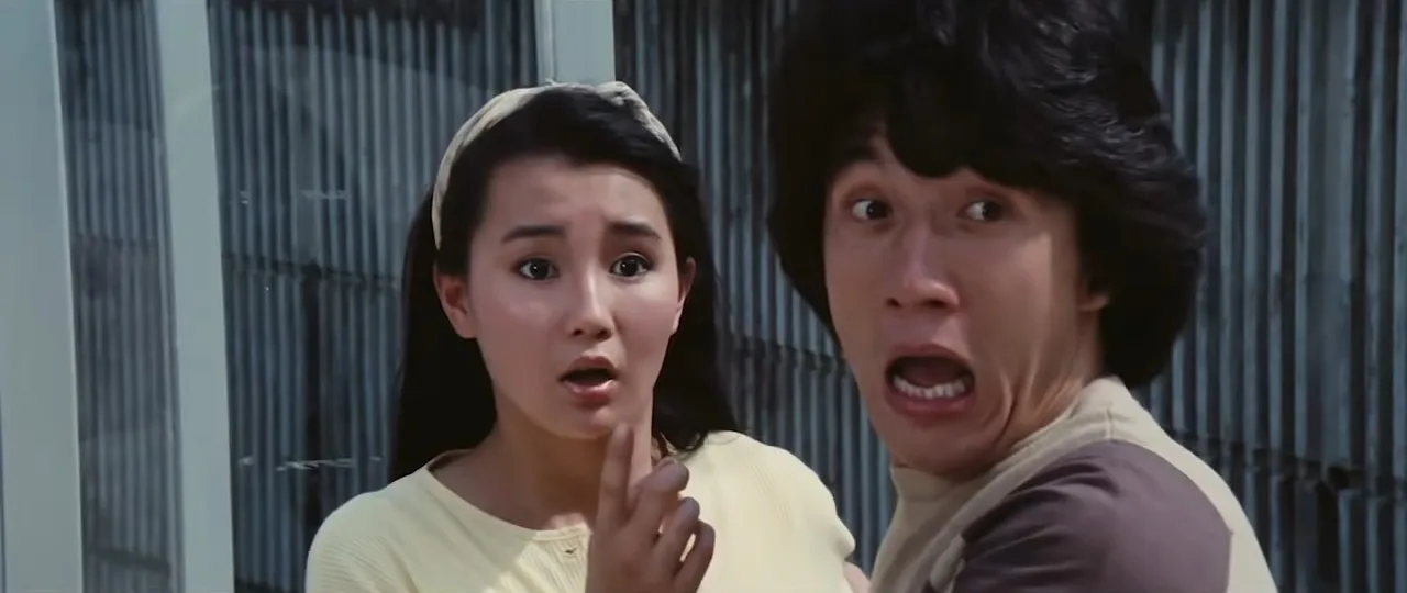A woman and a man looking frightened in "Police Story."