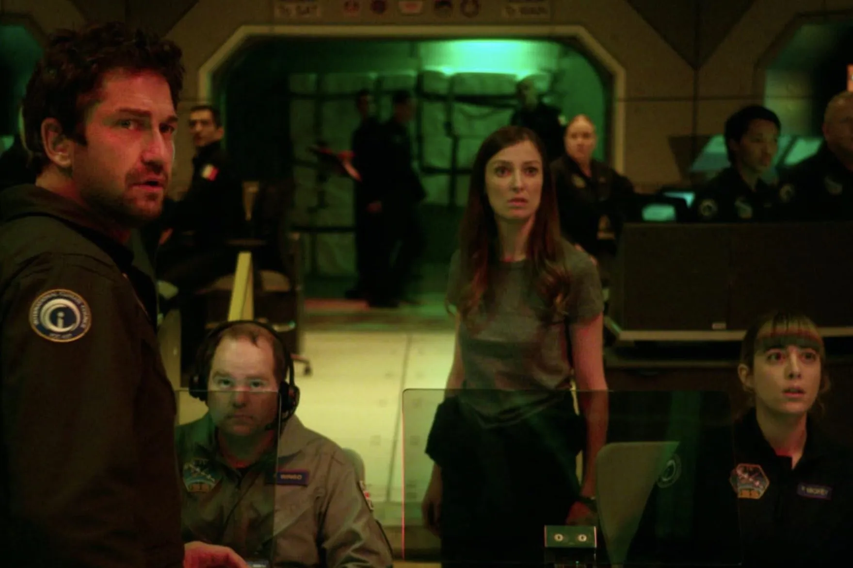 A group of scienstists in a room stare in disbelief.