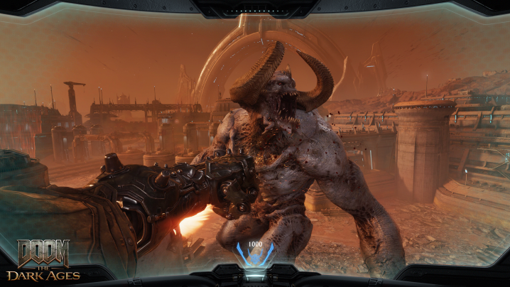 A mech punches a demon in Doom: The Dark Ages.