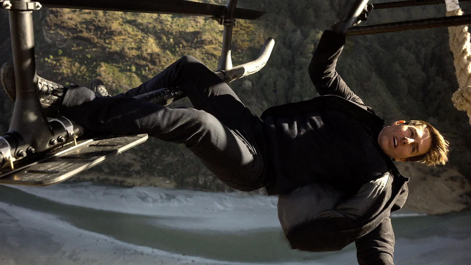 Tom Cruise hanging from the bottom of a helicopter in "Mission: Impossible - Fallout."