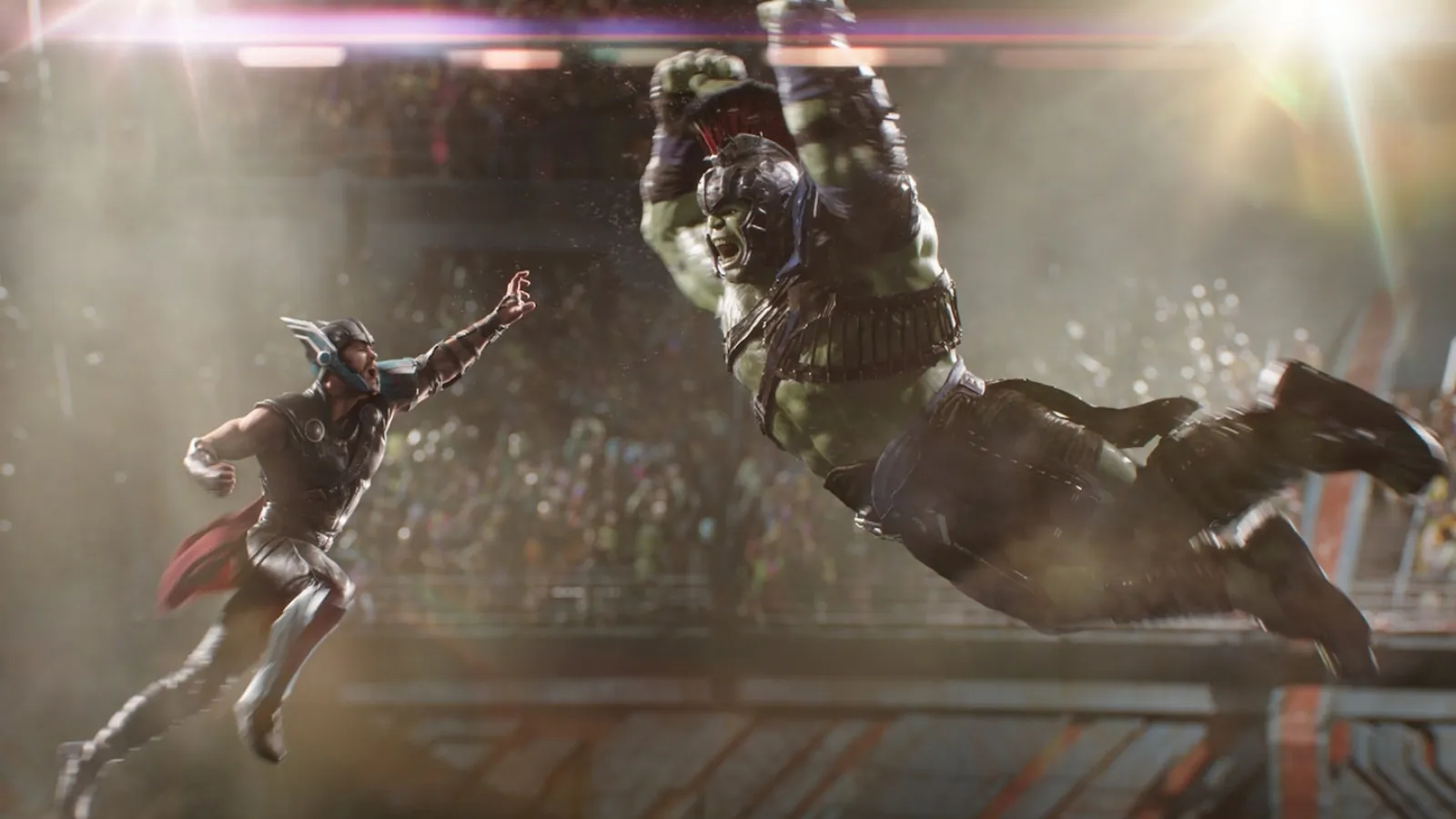 Thor and the Hulk jumping towards each other in "Thor: Ragnarok."