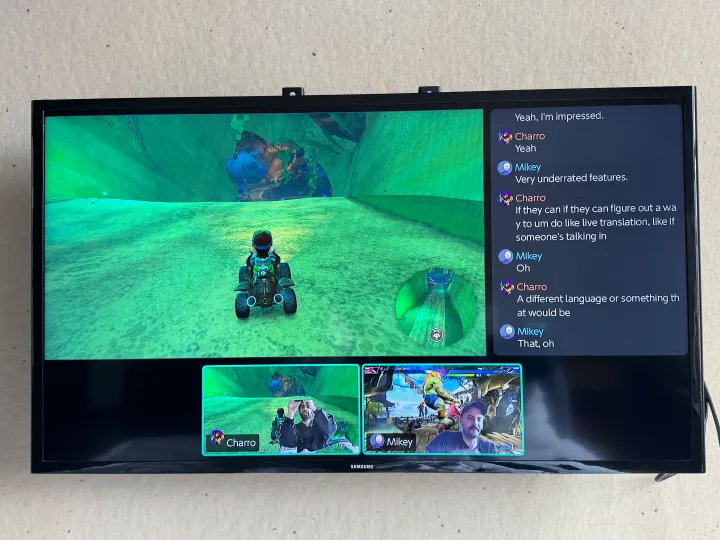A GameChat screen from a Nintendo Switch 2 appears on a TV.