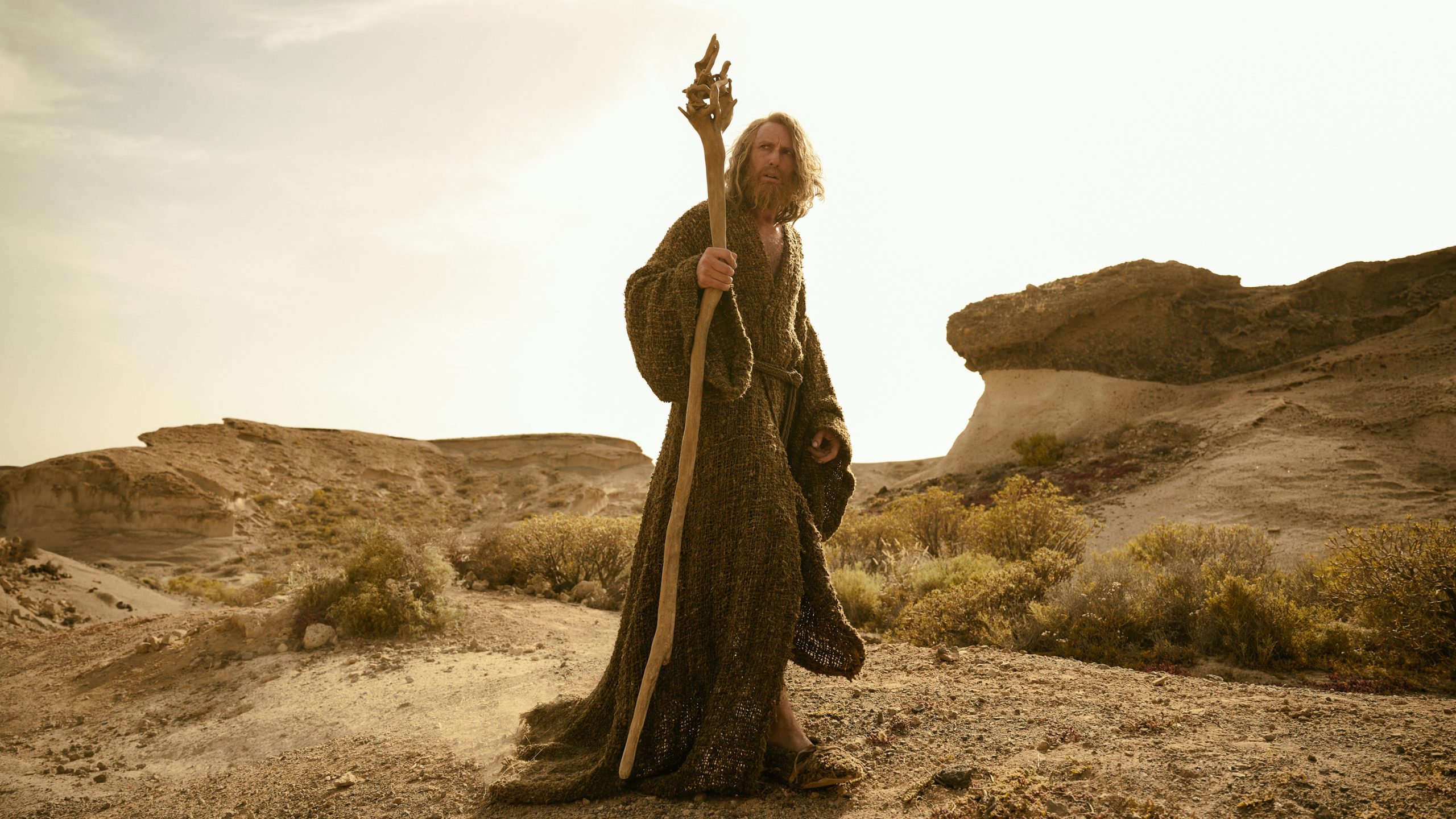 Gandalf (Daniel Weyman) holding his staff in &quot;The Rings of Power&quot; season 2