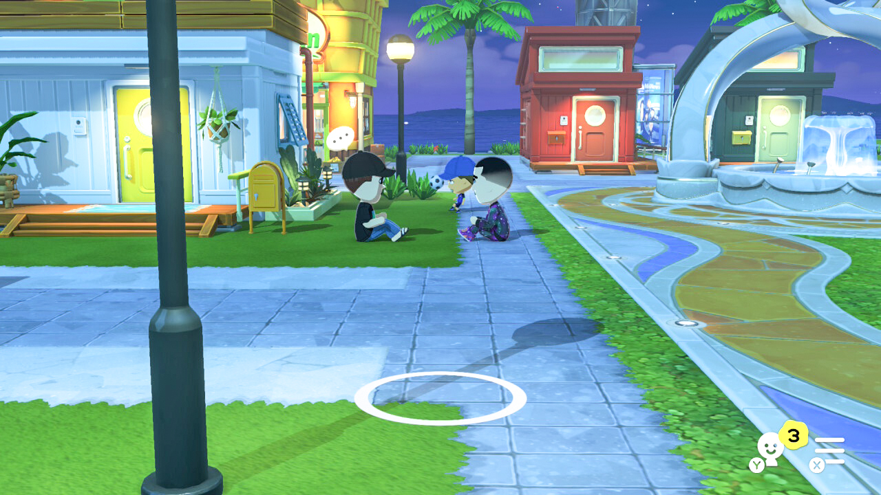 مجموعة من شخصيات Miis تجلس على الأرض وتتحدث فيما بينها في لعبة Tomodachi Life: Living the Dream