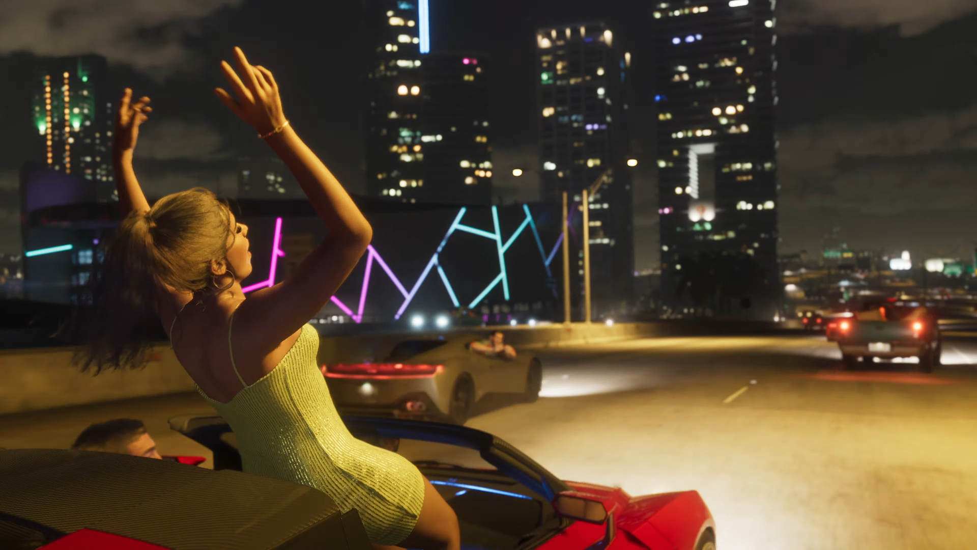 امرأة تقف في سيارة متحركة خلال مشهد في العرض الدعائي للعبة GTA 6.