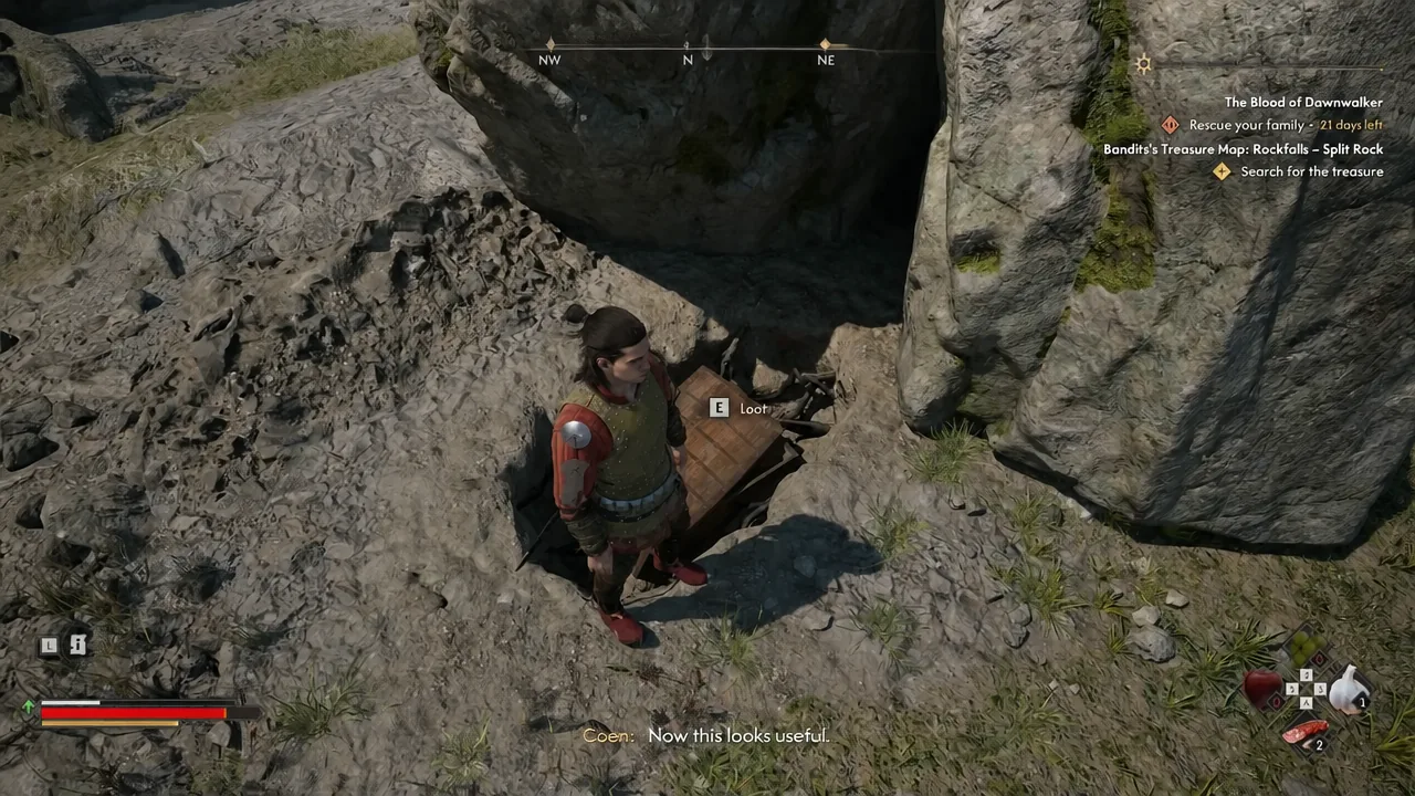 عرض للعبة يظهر موجه E Loot فوق صندوق الكنز المستخرج