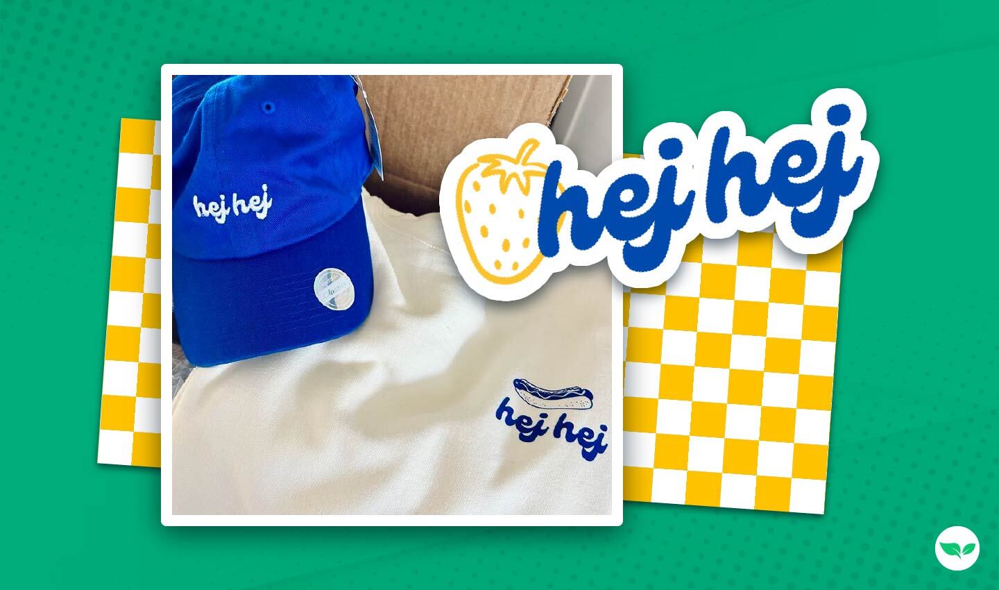 Productos de la marca Chef Hej Hej, incluyendo un sombrero azul marino y un suéter de lana color crema bordado con el logotipo de la salchicha.