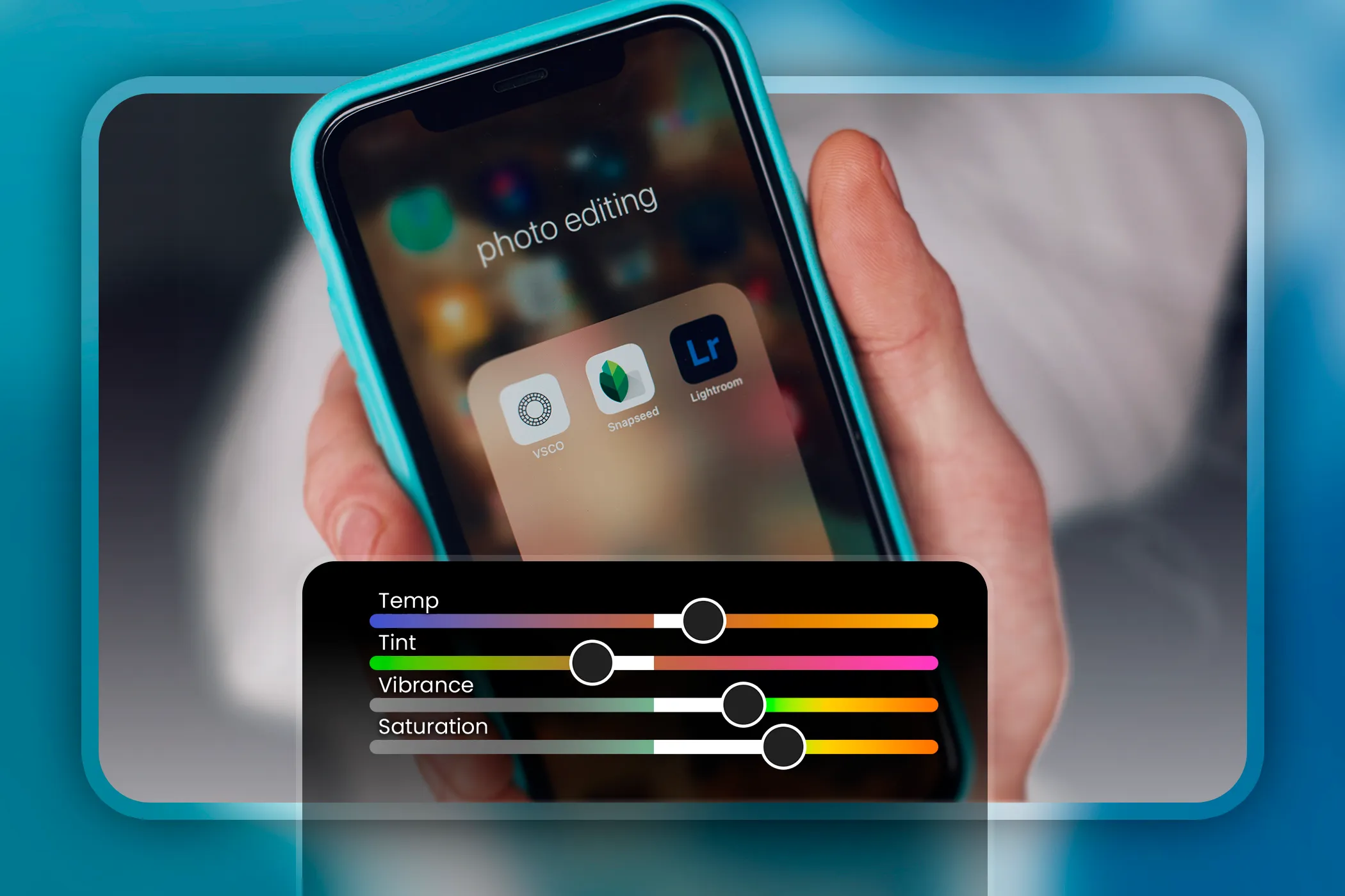 A hand holding a phone with some image editing apps displayed.