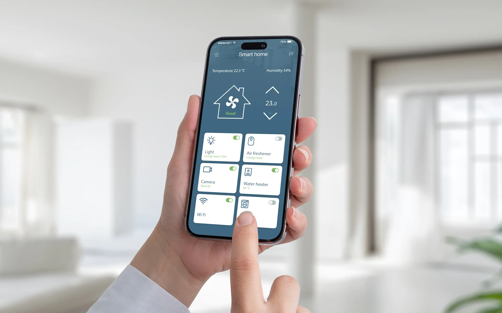 a man using an iPhone to control smart home devices