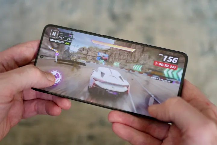 A person playing a game on the Poco F7 Ultra.