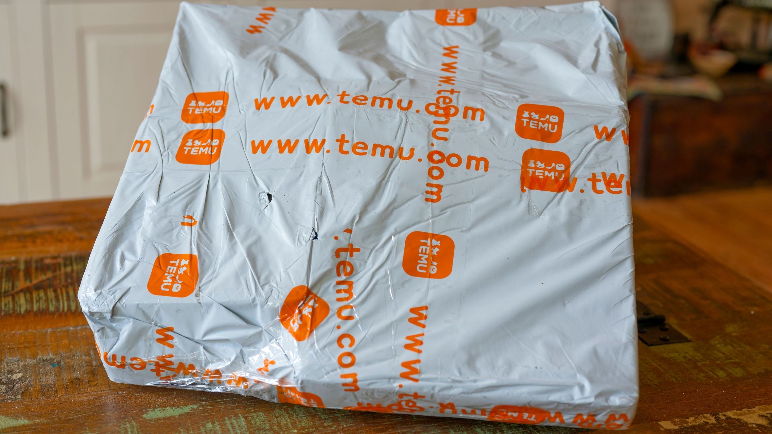 Temu Package on a Table