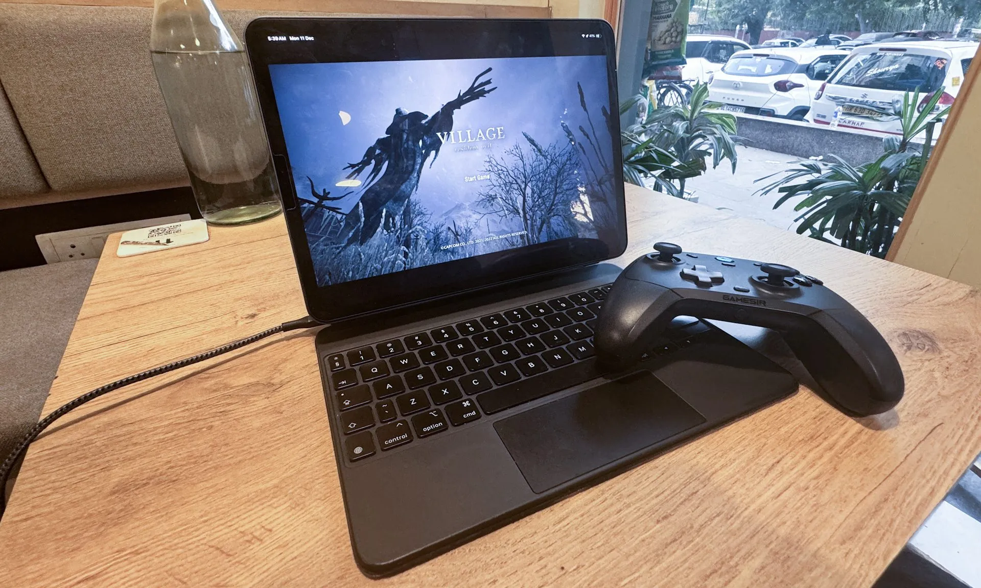 Title screen for Resident Evil Village on iPad Pro.