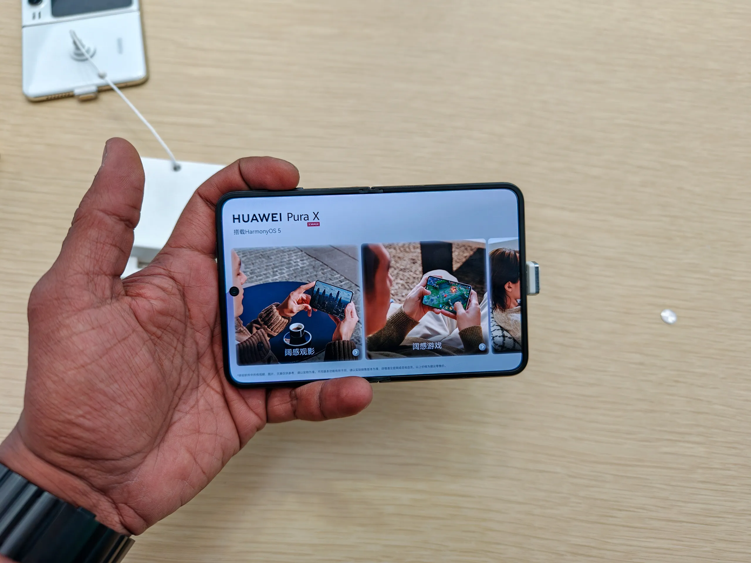 Huawei Pura X in white main display open rotated