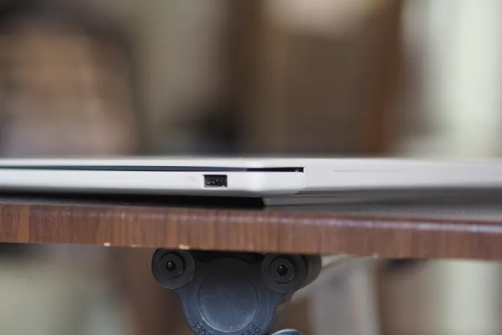 Asus Zenbook A14 rear view showing ports and edge.