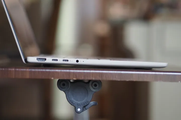 Asus Zenbook A14 side view showing lid and ports.