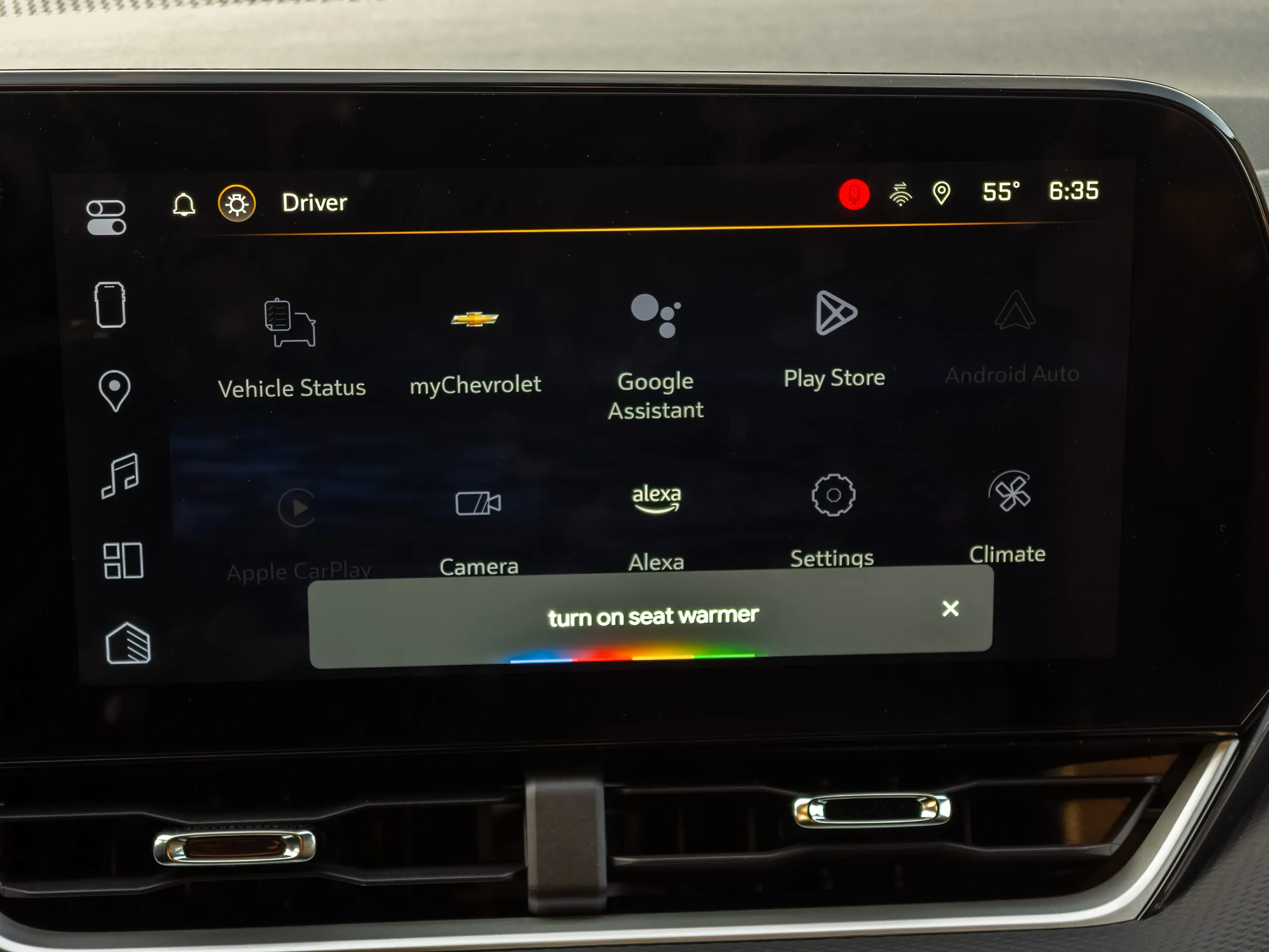 Google Assistant command "turn on seat warmer" running on Android Automotive on the Chevy Equinox 2025
