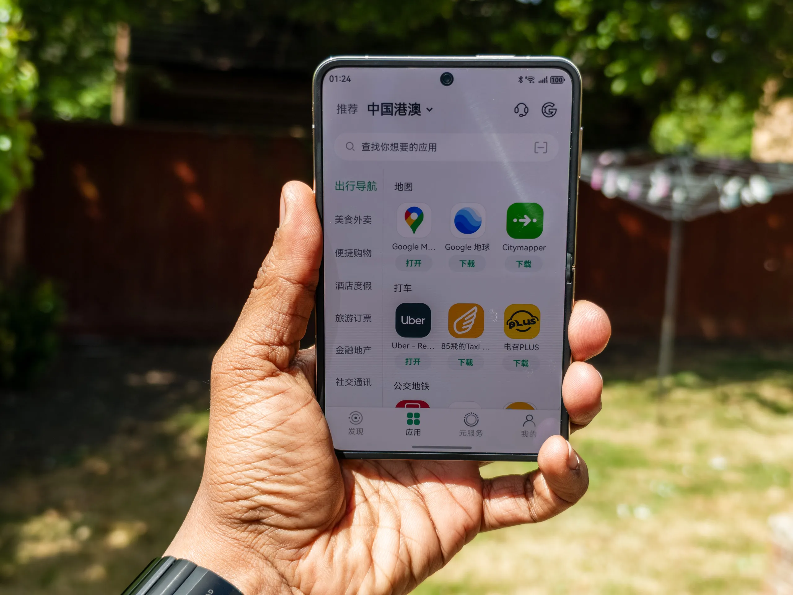 Third-party app store showing listings for Google Maps, Uber, Citymapper and other popular apps on the Huawei Pura X running HarmonyOS Next