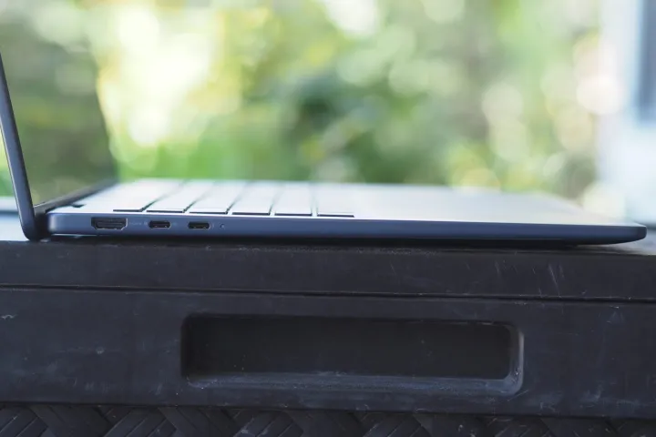 Dell Plus 16 2-in-1 side view showing lid and ports.