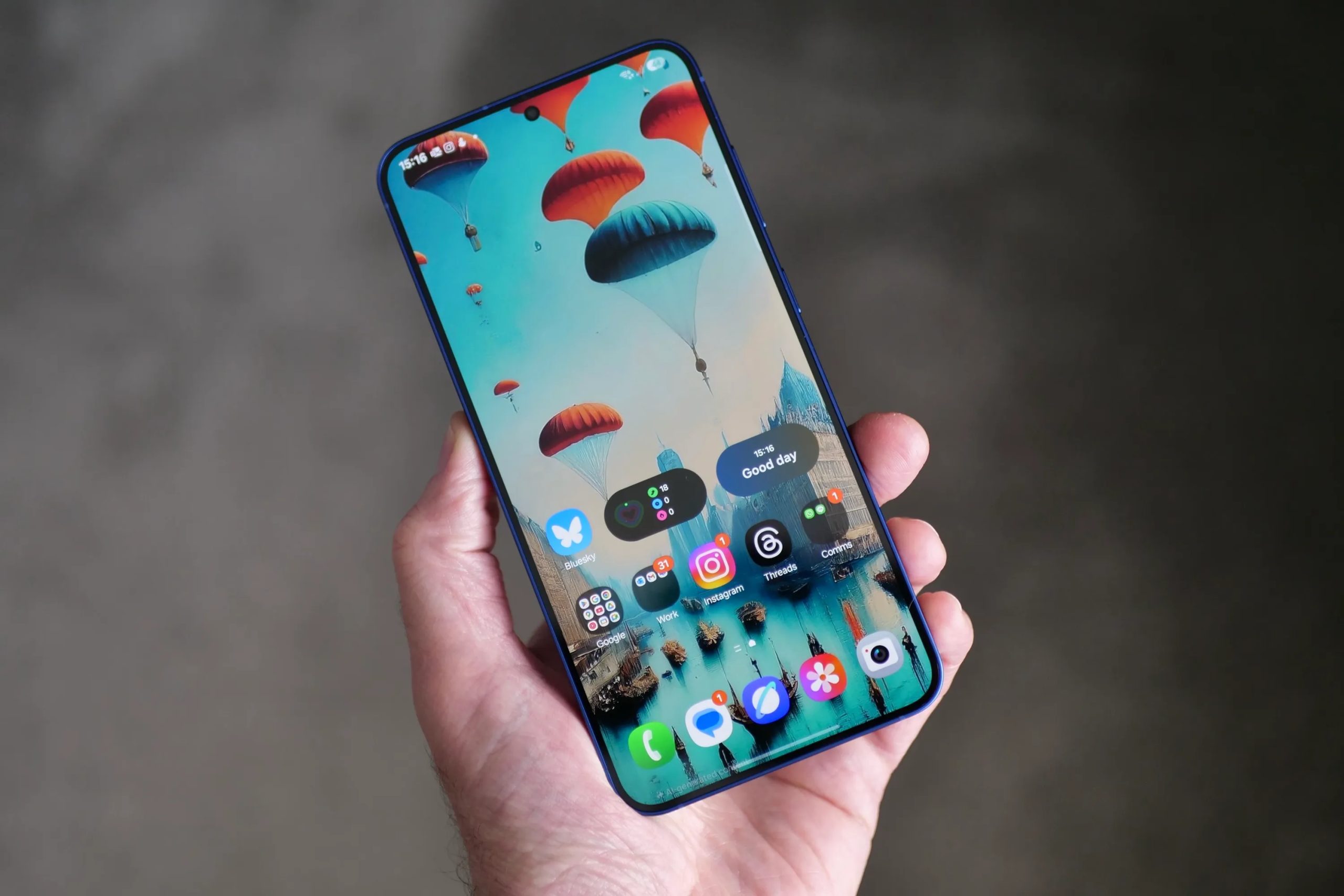 A person holding the Samsung Galaxy S25 Plus.