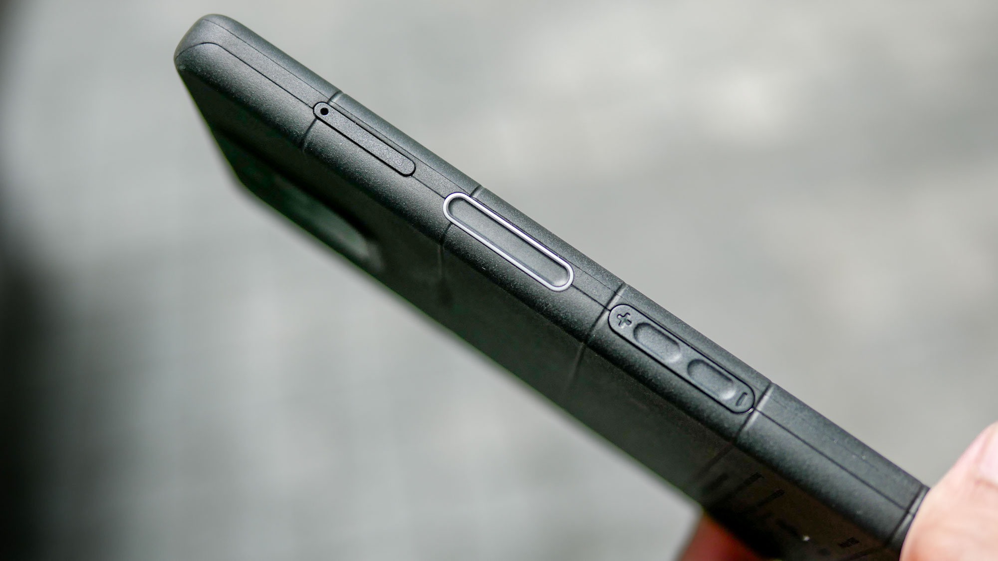 Sonim XP Pro push-to-talk button.