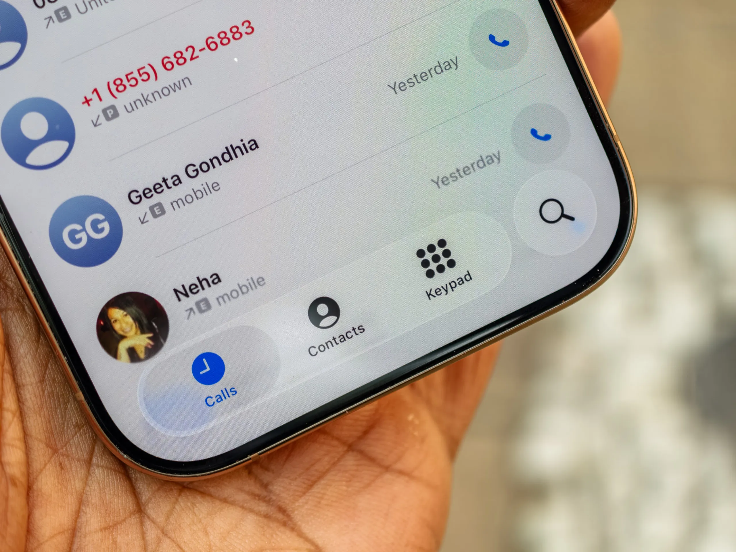 the new unified dialer Tabs in the iOS 26 developer beta 1 running on the iPhone 16 Pro