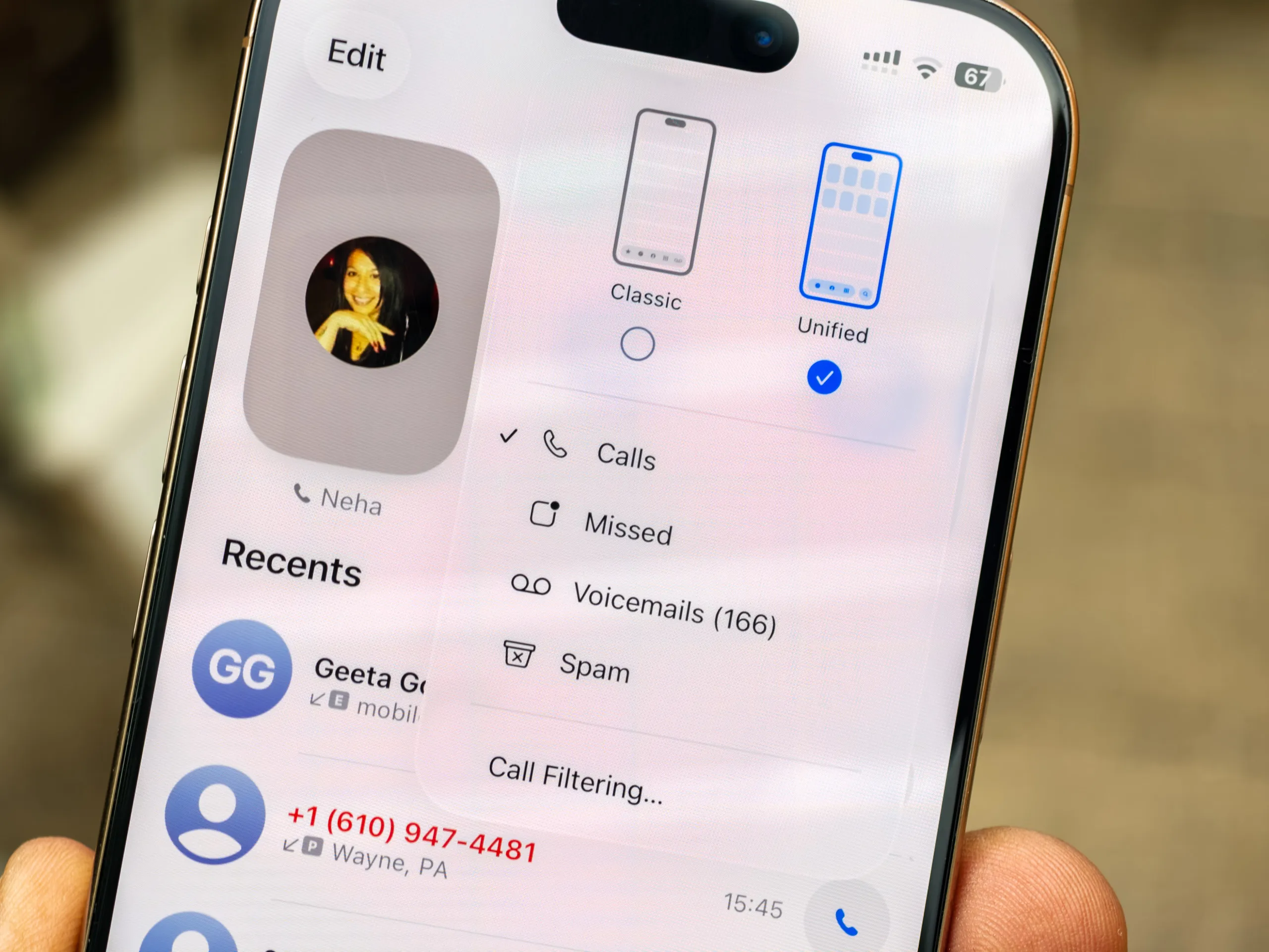 Option to revert the new unified dialer Tabs in the iOS 26 developer beta 1 running on the iPhone 16 Pro