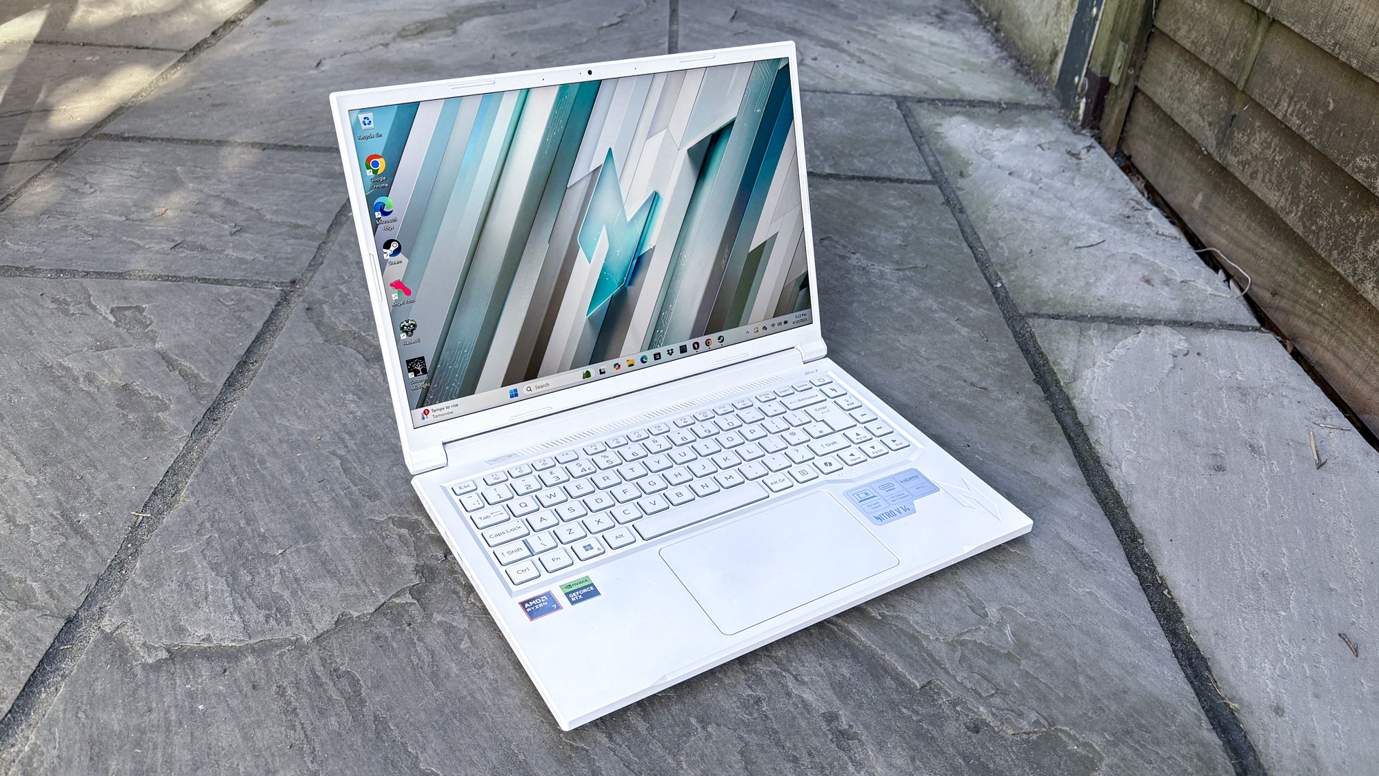 Acer Nitro V 14 in Pearl White on gray tiles