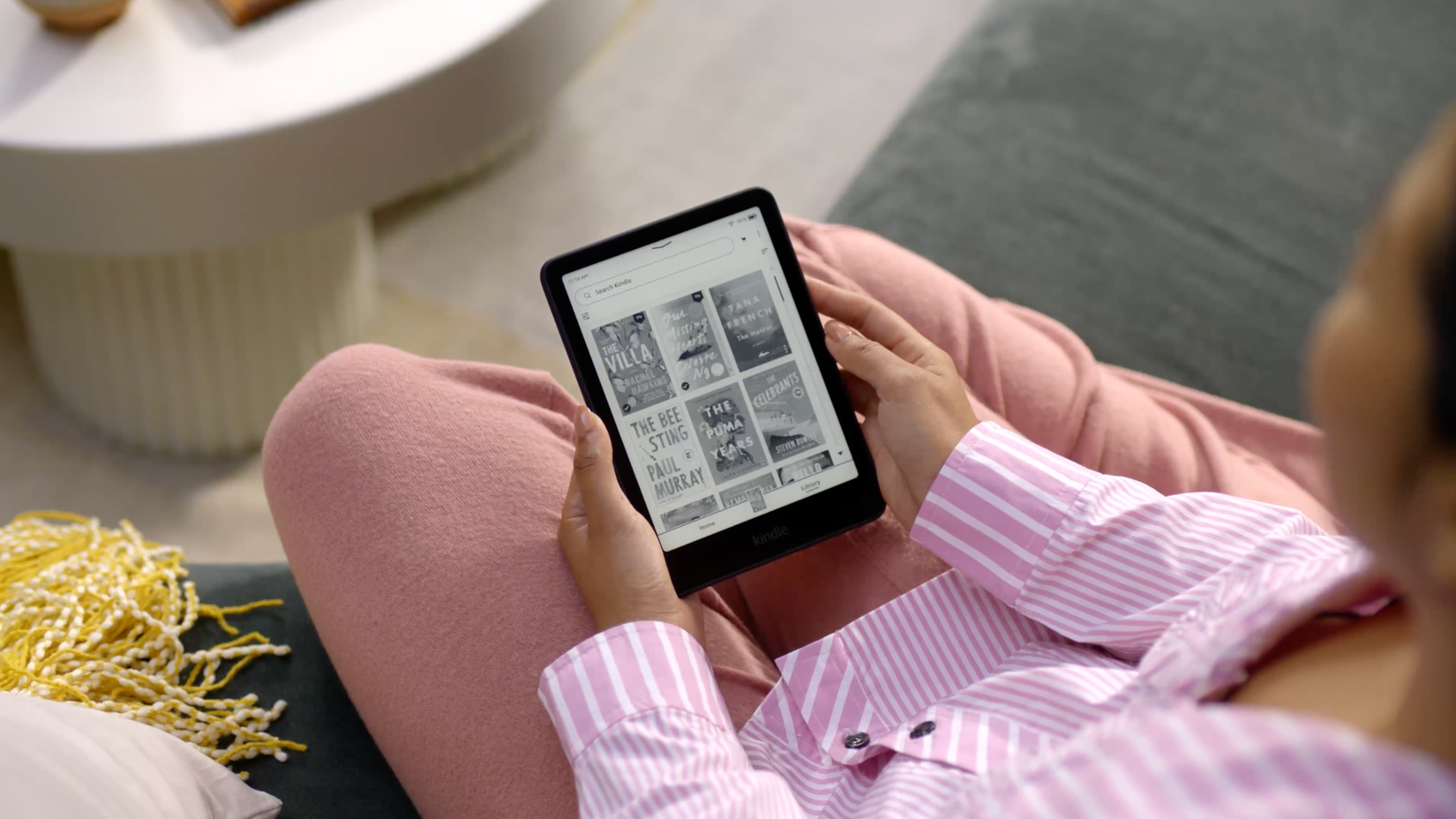 Person holding Amazon Kindle Paperwhite