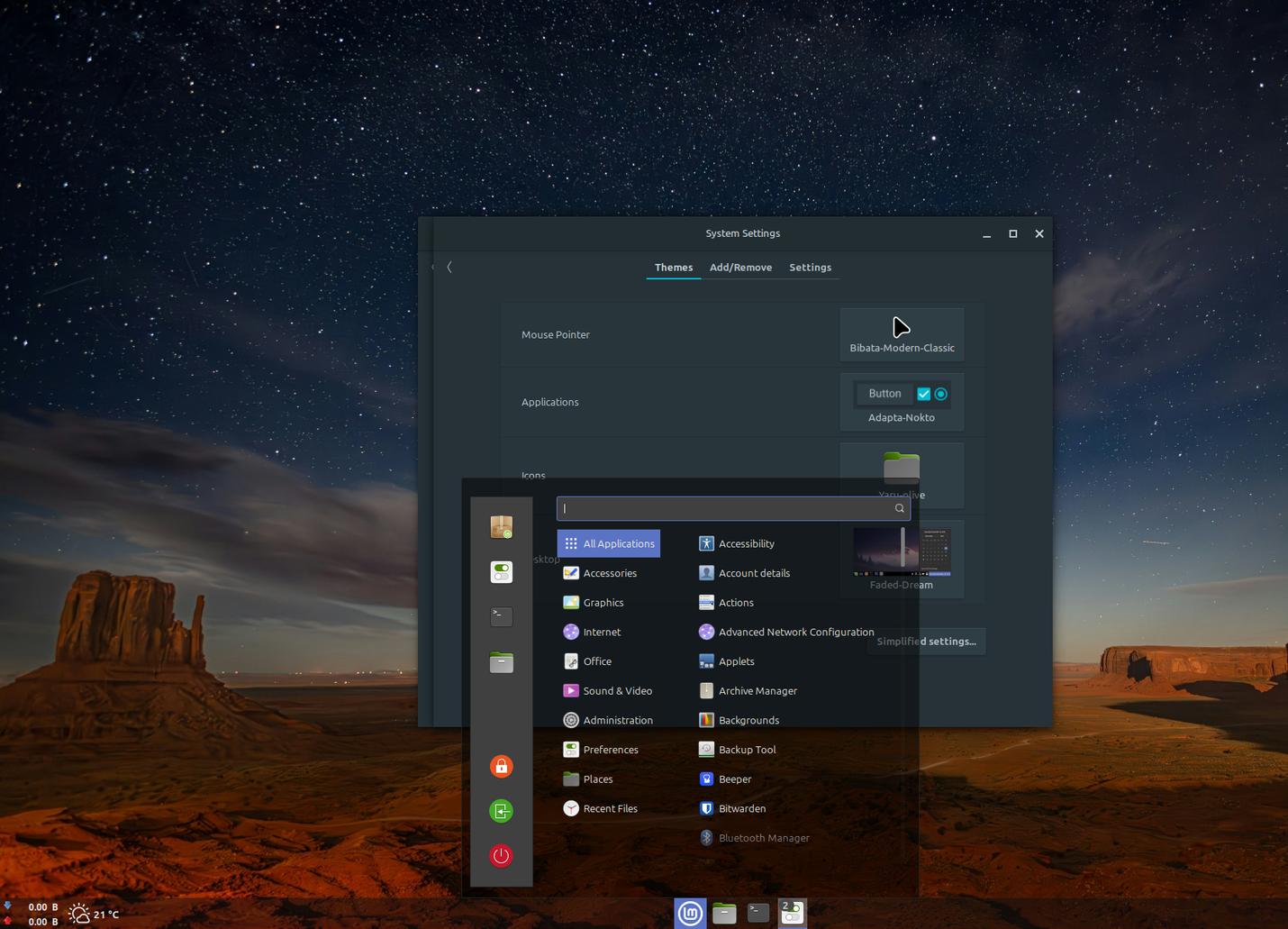 Screenshot of Linux Mint showing the desktop and launcher using the Faded Dream theme