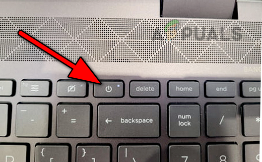 اضغط على زر الطاقة في HP Envy X360