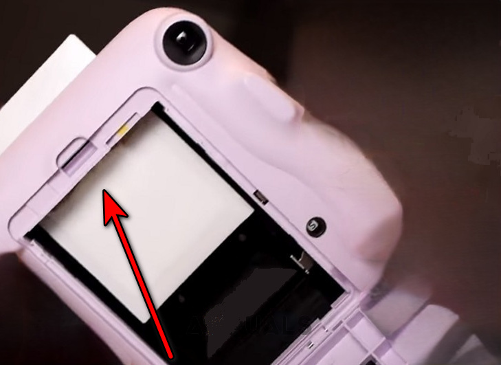 إزالة أي فيلم عالق من Instax Mini 11