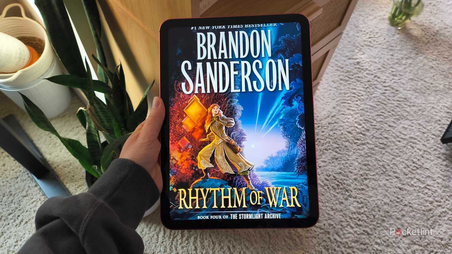 Rhythm of War على جهاز iPad.