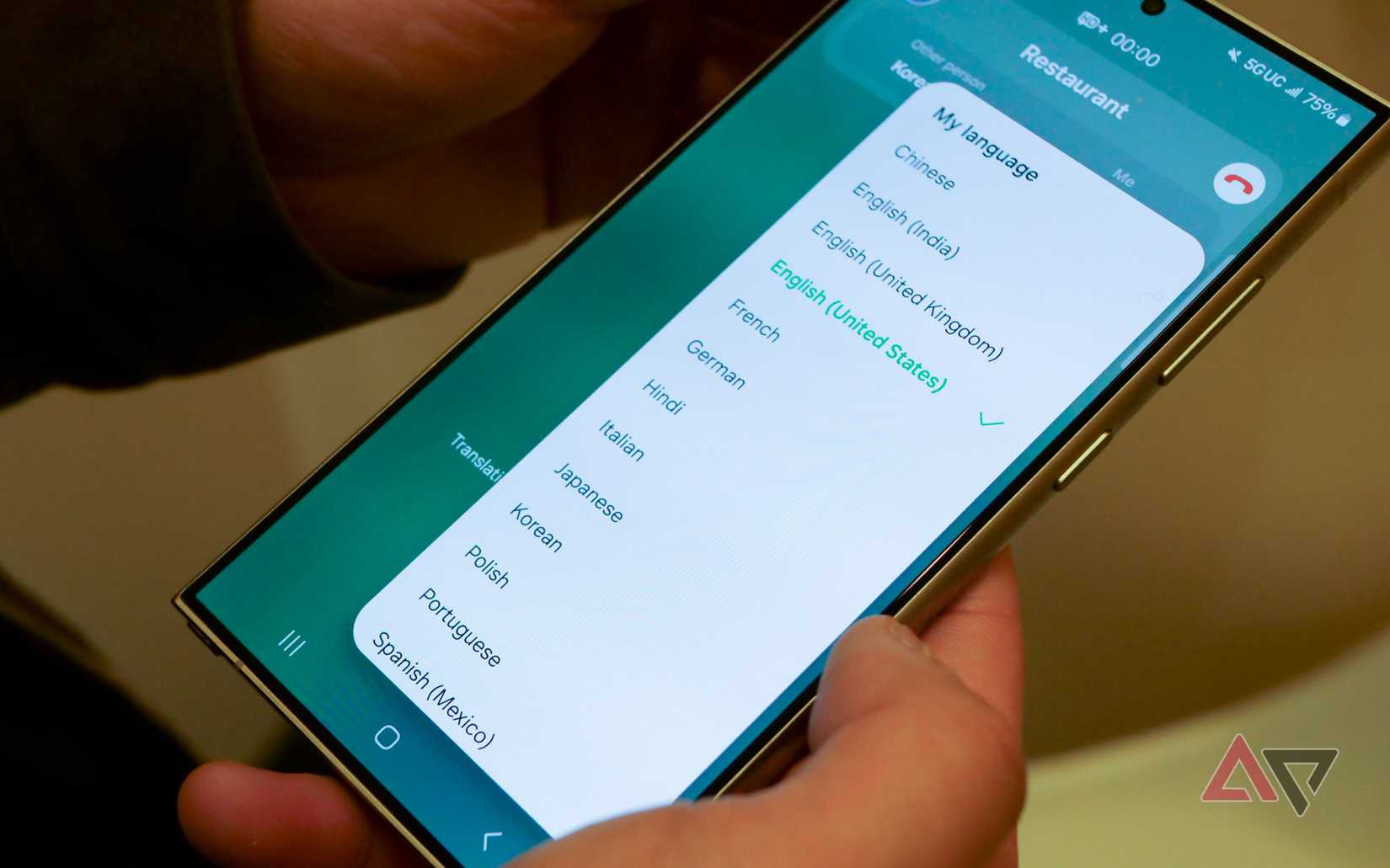 A Galaxy S24 Ultra on a call with a restaurant live translating between Korean and English.