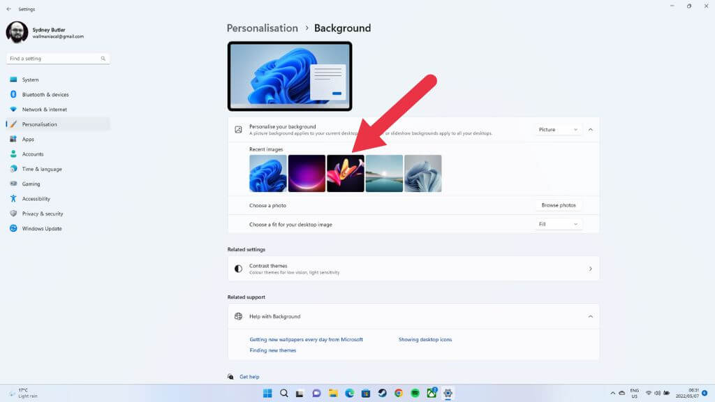 背景メニューから新しいデフォルトのデスクトップ背景を設定します。