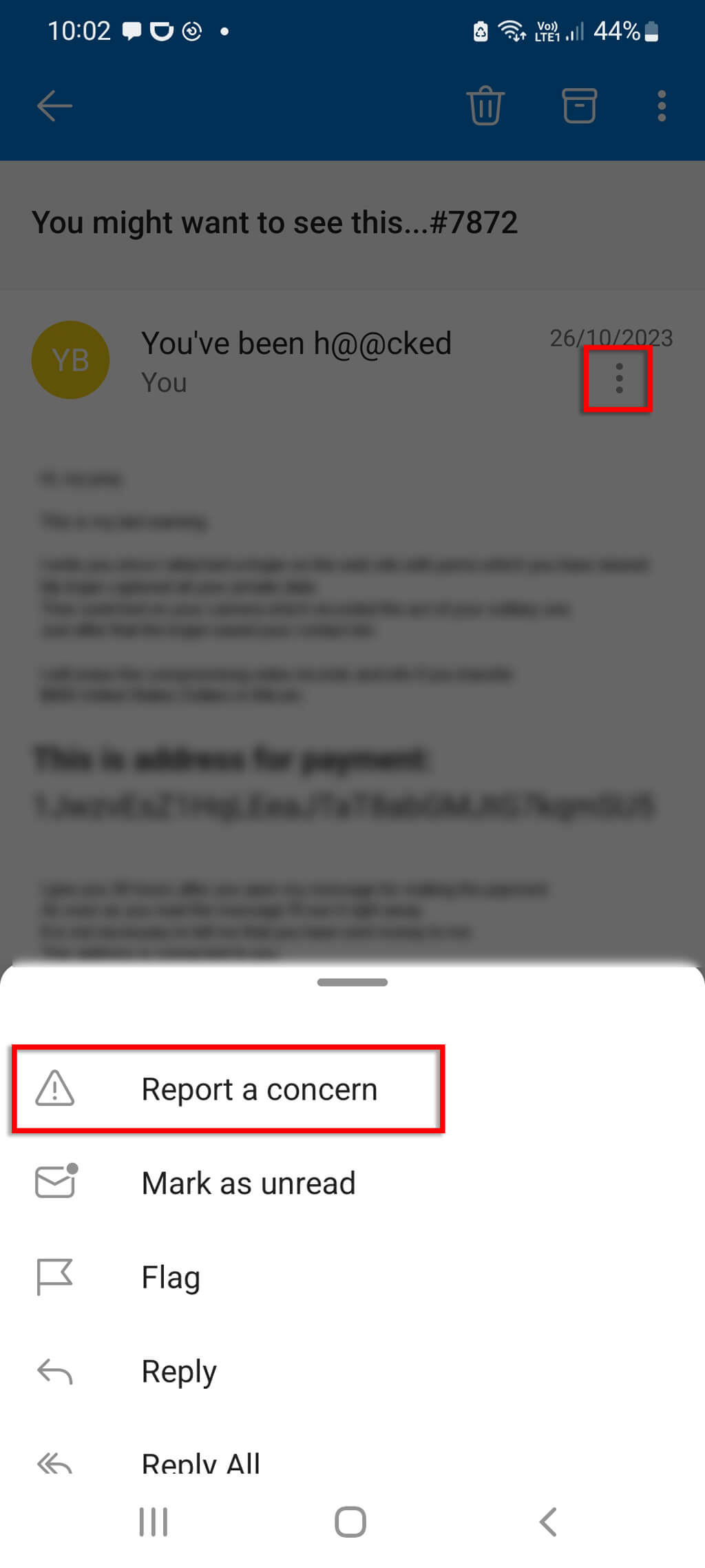 Select the three dots at the top of the email, then press Report a concern.