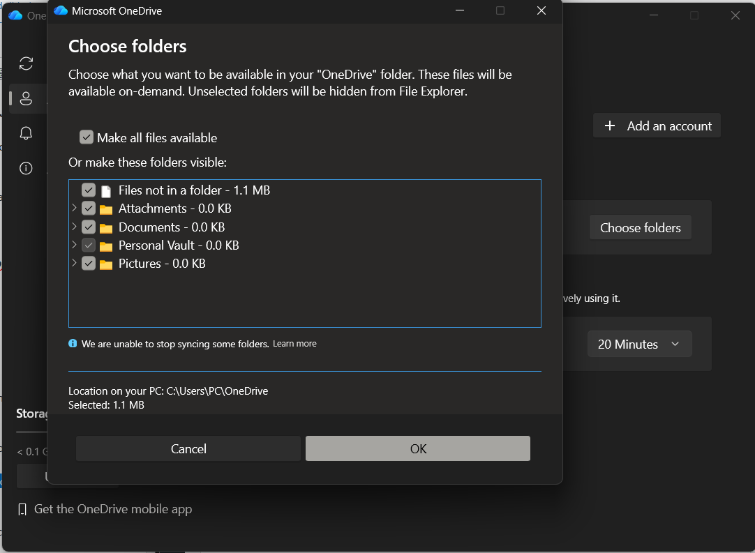 إعدادات حساب OneDrive على Windows تُظهر مربع حوار اختيار المجلدات لتحديد المزامنة المحلية.