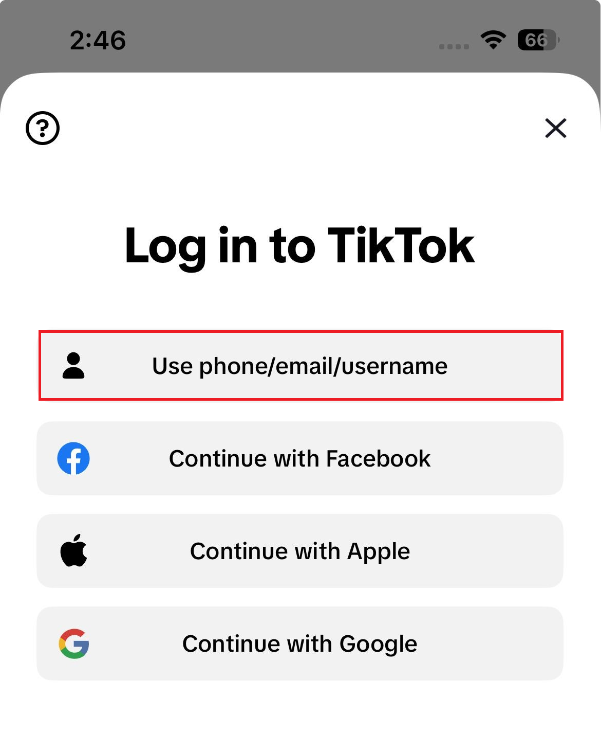 شاشة تسجيل الدخول إلى TikTok تعرض خيارات استخدام الهاتف أو البريد الإلكتروني أو اسم المستخدم وطرق التحقق البديلة.