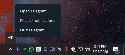 علبة نظام Windows تظهر Telegram لا يزال يعمل في الأيقونات المخفية بدلاً من فتح نافذة عادية.