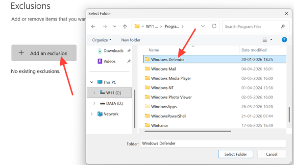لقطة شاشة توضح كيفية إضافة استثناءات للمجلدات في إعدادات Windows Defender